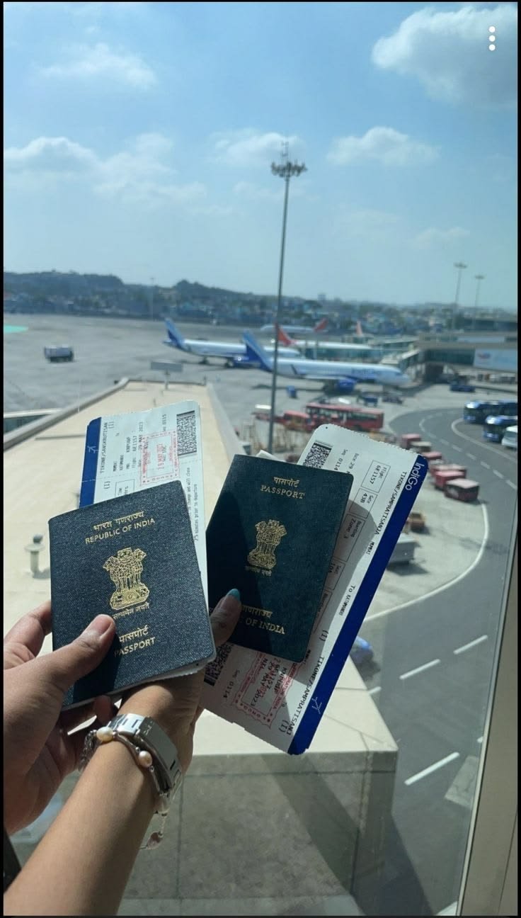 Traveller holding passports and flight tickets